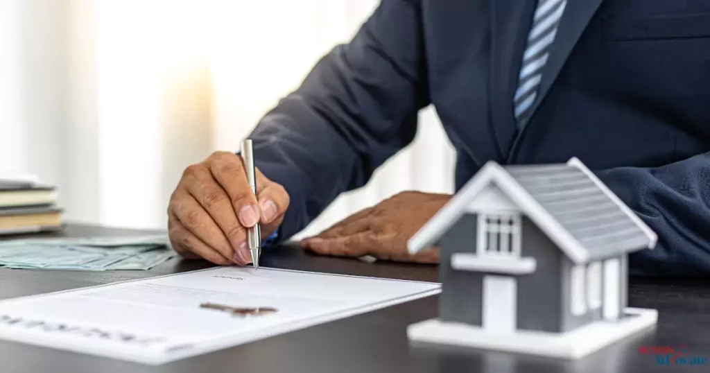 A close-up of property manager’s hands writing notes at a desk.